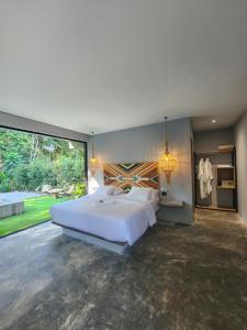 Voodi või voodid majutusasutuse Hotel Piedra Mulata - Adults Only toas