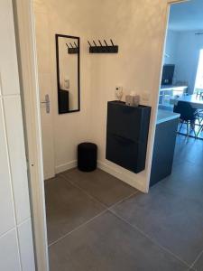 Telewizja i/lub zestaw kina domowego w obiekcie La Petite Escapade
