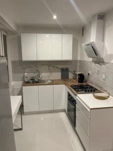 Kuchyň nebo kuchyňský kout v ubytování Apartament Centrum Okulickiego !