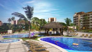 a pool at a resort with chairs and a gazebo at Praias do Lago ECO RESORT Bloco M Térreo in Caldas Novas