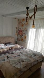 Cama o camas de una habitación en Divčibarski M.S.A. kutak