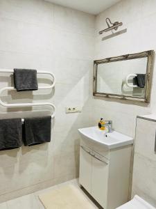 Vonios kambarys apgyvendinimo įstaigoje Saulėti apartamentai Trakuose/Sunny apartment in Trakai