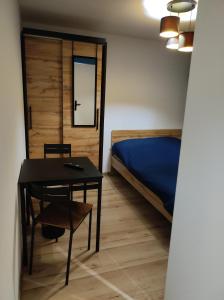 Posteľ alebo postele v izbe v ubytovaní Noclegi u Sylwii przy Termach w Cieplicach