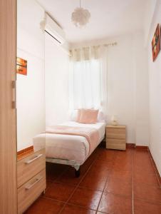 Posteľ alebo postele v izbe v ubytovaní Luchana Apartment