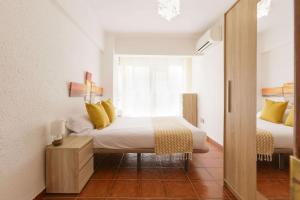 Posteľ alebo postele v izbe v ubytovaní Luchana Apartment