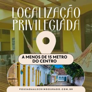 a poster for a museum with a picture of a house at Pousada Alecrim Dourado in Paraty