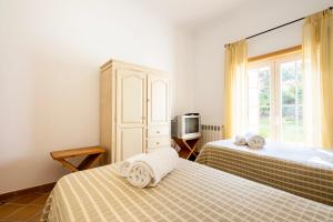Ένα ή περισσότερα κρεβάτια σε δωμάτιο στο Casa Aria +32 φωτογραφίες