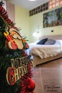 A bed or beds in a room at Camera il Nido