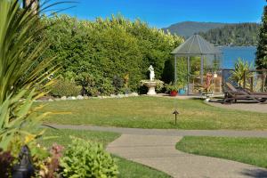 a park with a fountain and a gazebo at Seascape Beach House by IRIS PROPERTIES! in Sooke