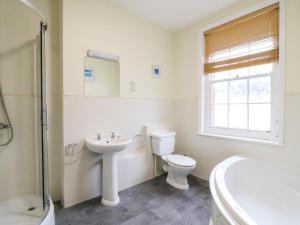 Et badeværelse på Louisa Cottage + 15 billeder