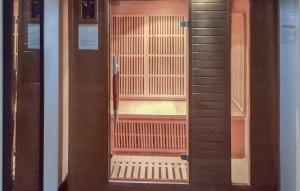 a glass door of a building with a balcony at 3 Bedroom Amazing Home In Bannalec in Bannalec +27 photos