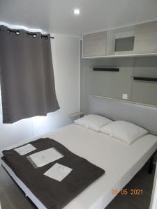 Katil atau katil-katil dalam bilik di Camping International