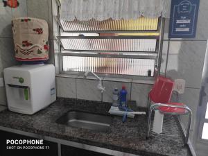 Køkken eller tekøkken på Casa perto da praia, Maitinga + 36 billeder