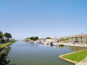 a view of a river with boats in it at Foxglove Lodge - Uk13448 in Halwill