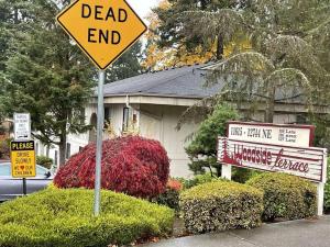 a dead end sign in front of a house at Livable B in kirkland in Kirkland