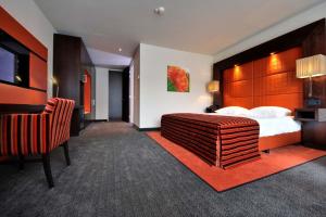 Postel nebo postele na pokoji v ubytování Van der Valk Hotel Hilversum/ De Witte Bergen
