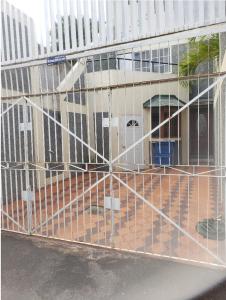 a metal fence in front of a building at Pearl of the City NEW KINGSTON in Kingston