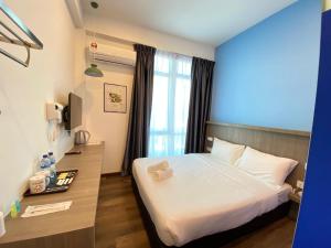 Postel nebo postele na pokoji v ubytování BENUTTEN 99 HOTEL