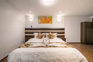 Postelja oz. postelje v sobi nastanitve Manantial Hostal No.004