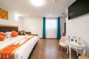 Postelja oz. postelje v sobi nastanitve Manantial Hostal No.004