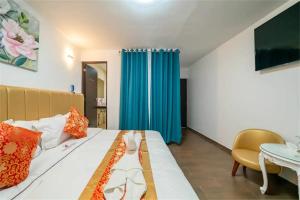 Postelja oz. postelje v sobi nastanitve Manantial Hostal No.004
