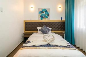 Postelja oz. postelje v sobi nastanitve Manantial Hostal No.004