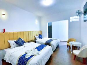 Postelja oz. postelje v sobi nastanitve Manantial Hostal No.004