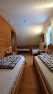 Postel nebo postele na pokoji v ubytování Vāgnera parks