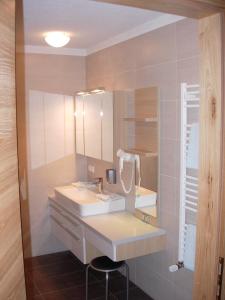 Bagno di Erlebnis-Hotel-Appartements