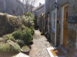 a small alley way in an old house at Bucca Cottage in Newlyn