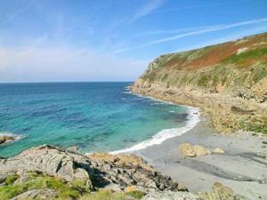 a view of a beach with the ocean at Porth Nanven Barn in St Just