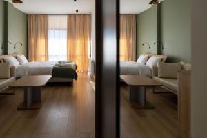 Voodi või voodid majutusasutuse Hotel 1700 toas