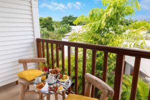 Balcon ou terrasse dans l'établissement Habitation Saint Charles - Hôtel de Charme & Spa