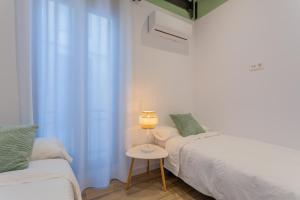 Posteľ alebo postele v izbe v ubytovaní Apartamento Cetti Meriem