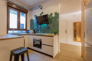 Kuchyňa alebo kuchynka v ubytovaní Apartamento Cetti Meriem