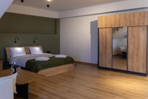 Voodi või voodid majutusasutuse Hotel 1700 toas