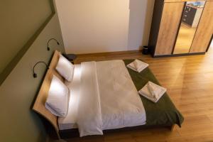 Voodi või voodid majutusasutuse Hotel 1700 toas