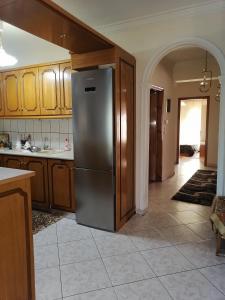 Kuchyň nebo kuchyňský kout v ubytování POPI 'S HOME