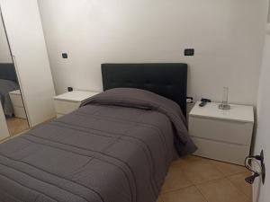 Postel nebo postele na pokoji v ubytování BELLA ASSISI B & B
