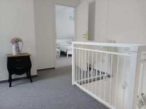 Postel nebo postele na pokoji v ubytování Pod skálou, Mánesova 646