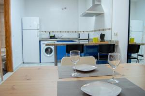 A kitchen or kitchenette at Novam Studio Centro de Málaga.