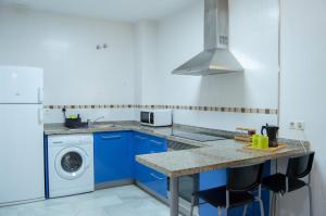 A kitchen or kitchenette at Novam Studio Centro de Málaga.