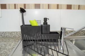 A kitchen or kitchenette at Novam Studio Centro de Málaga.