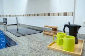 A kitchen or kitchenette at Novam Studio Centro de Málaga.