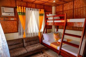 Ein Bett oder Betten in einem Zimmer der Unterkunft Rock Island Eres Bella