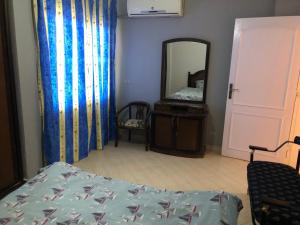 En eller flere senger på et rom på Tow bedroom flat at Muntazah Sharm Elshikh