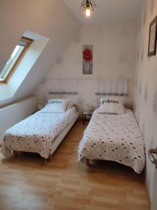 Postel nebo postele na pokoji v ubytování gîte Brocéliande - Closeries du Golfe
