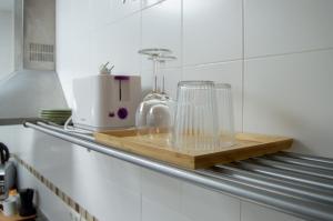 Kuchyň nebo kuchyňský kout v ubytování Novam Loft Terrace Centro Málaga