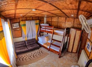Ein Bett oder Betten in einem Zimmer der Unterkunft Rock Island Eres Bella