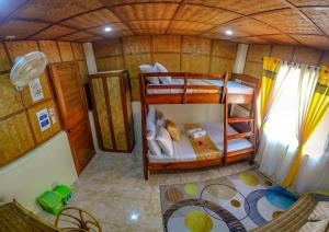 Ein Bett oder Betten in einem Zimmer der Unterkunft Rock Island Eres Bella